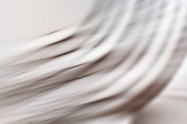 Soyut, enerjik bir arkaplan. Renkli, dalgalı duvar kâğıdı. Grafik çizimi. Üst üste gelen yumuşak dalgalı çizgiler.