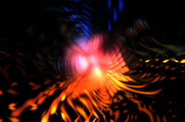 Işık parçacık izleri. Parlayan parçacıkları ve çizgileri olan ışık patlaması yıldızı. Güzel hareketli soyut ışın arkaplanı.