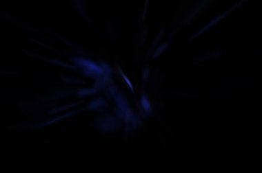 Işık parçacık izleri. Parlayan parçacıkları ve çizgileri olan ışık patlaması yıldızı. Güzel hareketli soyut ışın arkaplanı.