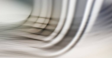 Soyut, enerjik bir arkaplan. Renkli, dalgalı duvar kâğıdı. Grafik çizimi. Üst üste gelen yumuşak dalgalı çizgiler.