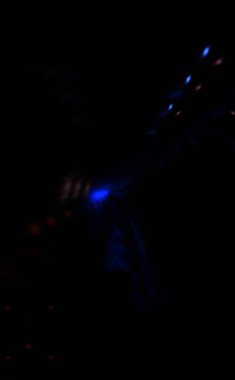 Işık parçacık izleri. Parlayan parçacıkları ve çizgileri olan ışık patlaması yıldızı. Güzel hareketli soyut ışın arkaplanı.