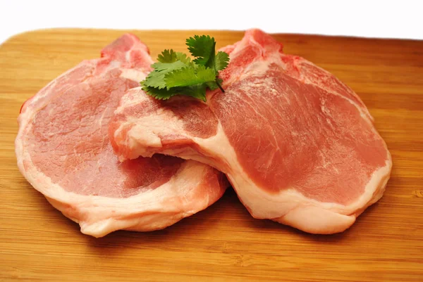 Rauwe Porkchops Gegarneerd Met Peterselie — Stockfoto