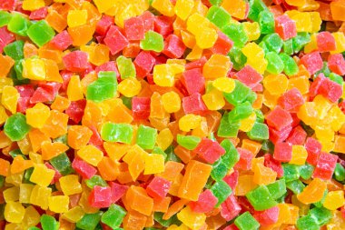 Renkli şekerli meyve arkaplanı. Üst görünüm, yakın plan.