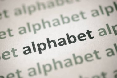 beyaz kağıt makro üzerinde basılı kelime dil