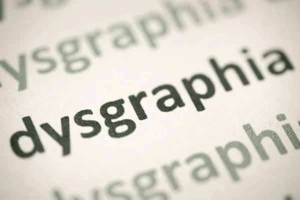 Beyaz Kağıt Makro Üzerinde Basılı Kelime Disgrafi — Stok fotoğraf