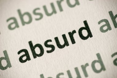 word absurd printed on white paper macro clipart