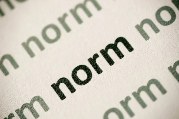 Mot Norme Imprimé Sur Papier Blanc Macro — Photo