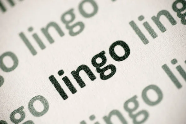 Lingo Słowo Drukowane Białym Papierze Makro — Zdjęcie stockowe