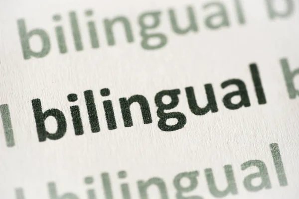 Word Bilingual Printed White Paper Macro — Stock Photo, Image