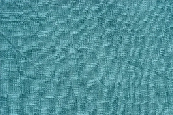 turquoise color  creased fabric background texture