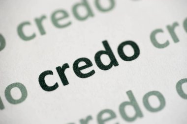 Beyaz kağıt makrosu üzerine basılmış sözcük inancı