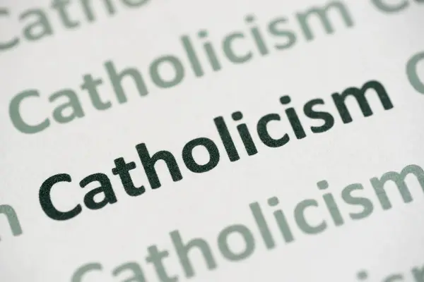 Parola Cattolicesimo Stampato Carta Bianca Macro — Foto Stock