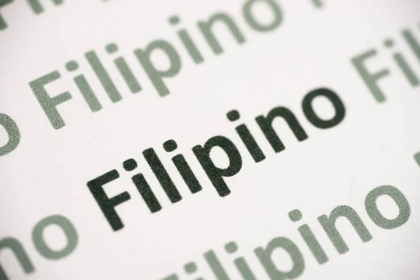 Wort Philippinische Sprache Auf Weißem Papier Makro Gedruckt — Stockfoto