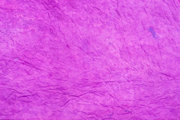 violet creased colored tissue paper background texture macro