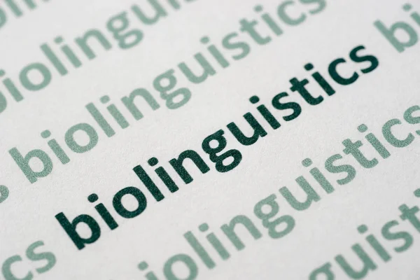 Parola Biolinguistica Stampata Carta Bianca Macro — Foto Stock
