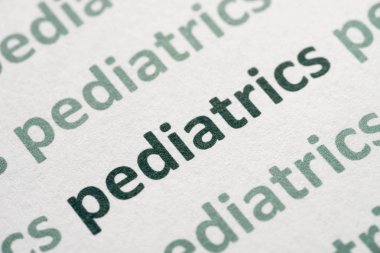 uyumak kağıt makro üzerinde basılı kelime Pediatri