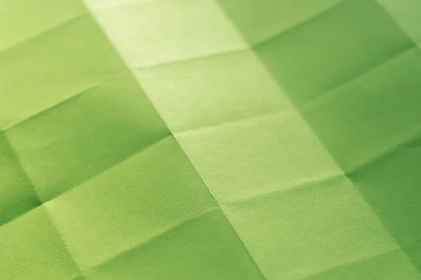 Hoja verde de papel doblado fondo —  Fotos de Stock