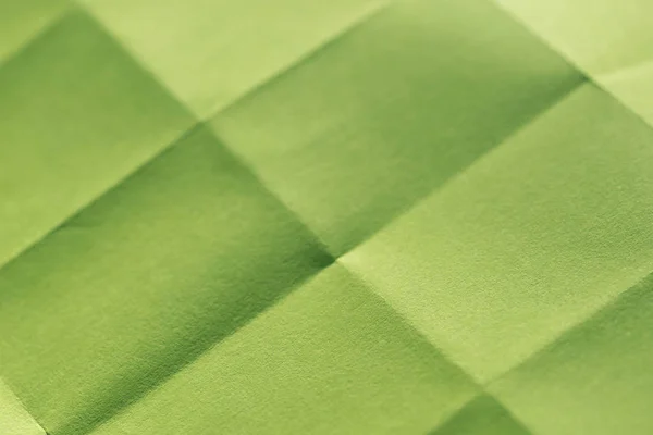 Lembar hijau dari latar belakang terlipat kertas — Stok Foto