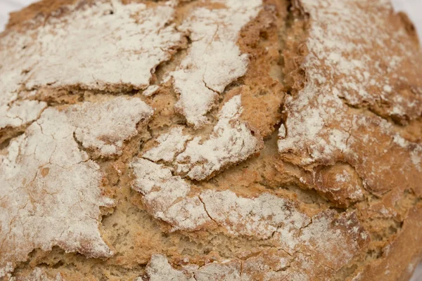 Rustic rotund pâine textura macro — Fotografie, imagine de stoc
