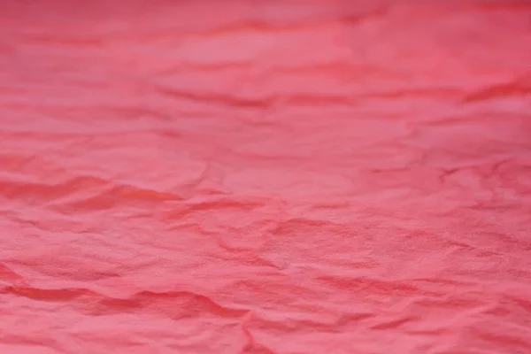 Rojo tejido arrugado papet fondo textura enfoque selectivo macr — Foto de Stock