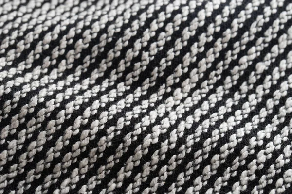 黒と白の折り畳まれた織物テクスチャ背景 — ストック写真