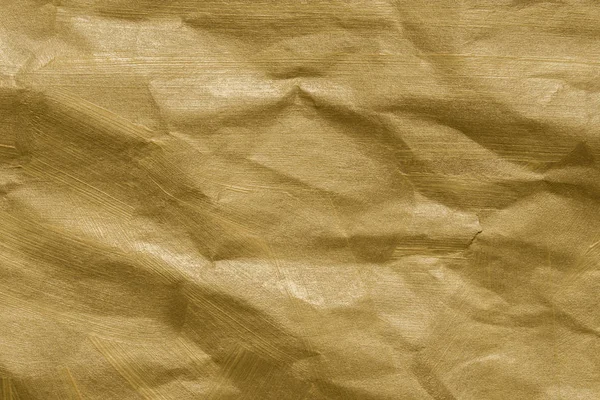 Текстура бумаги с золотой краской — стоковое фото