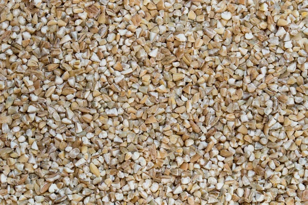 Raw barley groats healhty food background — Stock Photo, Image