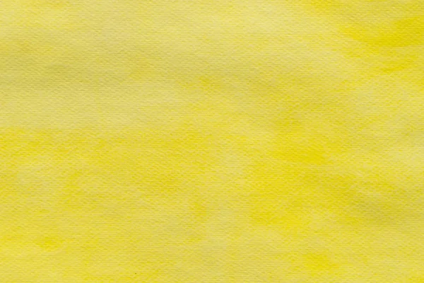 สีเหลืองทาสีบนพื้นหลังกระดาษ — ภาพถ่ายสต็อก