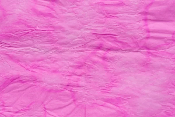 Rózsaszín gyűrött papír szövet háttér textúra — Stock Fotó