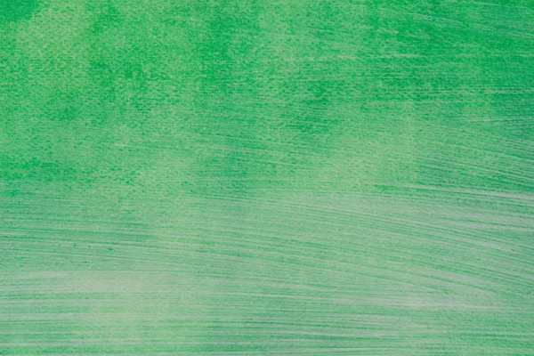 紙の背景テクスチャに描かれた緑のアクリル — ストック写真