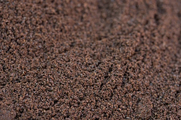 Ground coffee background texture selective focus — Stock Photo, Image
