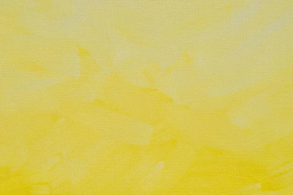 Textura de fondo amarillo pintado sobre lienzo artístico — Foto de Stock