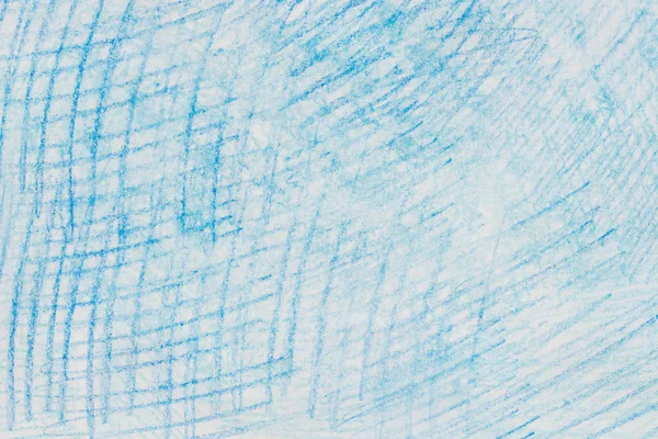 blue crayon doodles on paper background texture