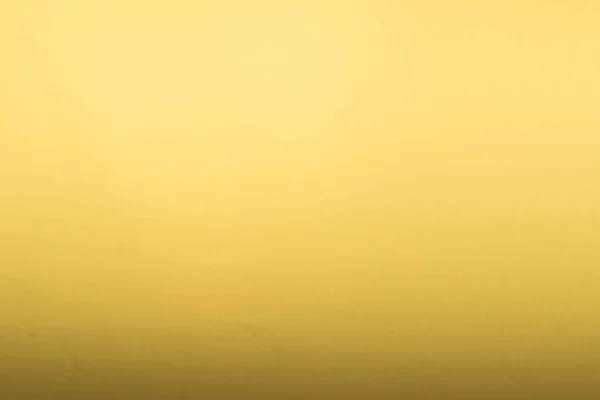 Rolo amarelo feito com folhas curvas de fundo de papel textur — Fotografia de Stock