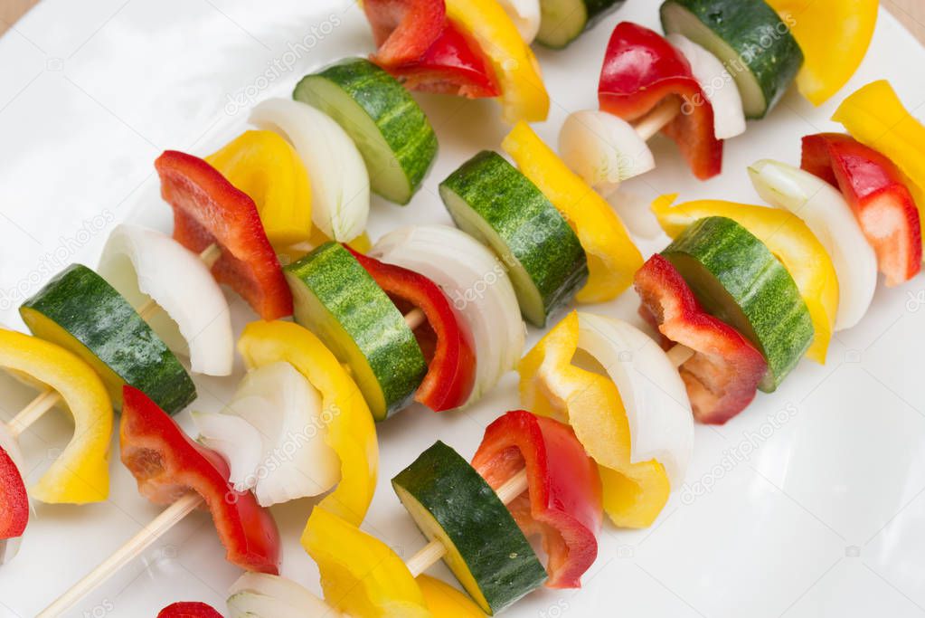 fresh raw vegetables on sticks for grill 