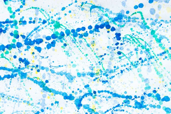 Mehrfarbige Aquarellkleckse auf weißem Papierhintergrund — Stockfoto