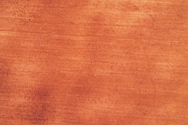 Toprak dokusu arka planı. Baharın başında sürülmüş tarla. Kahverengi arazi yüzeyi