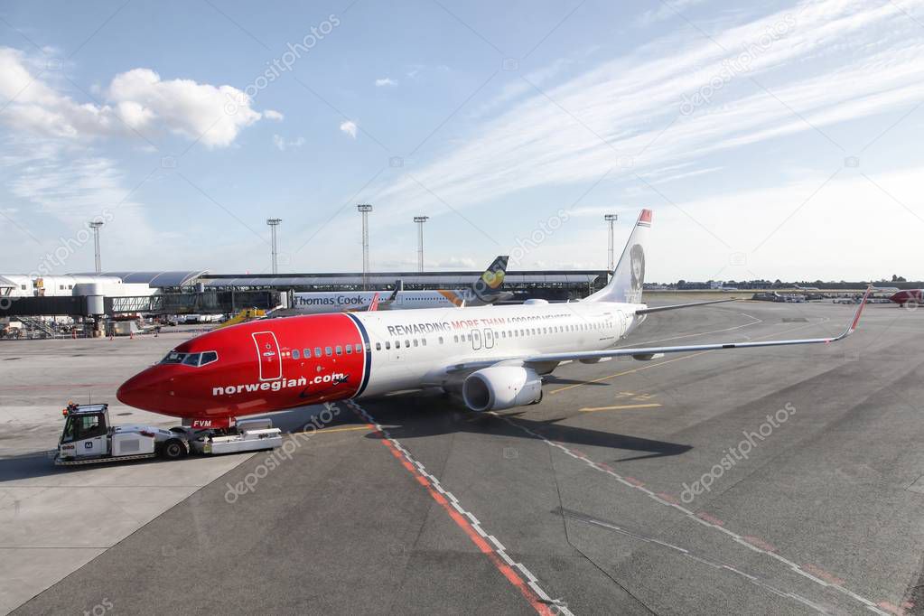 Copenhagen, Denmark - June 24, 2018: Norwegian aircraft at Copenhagen airport in Denmark. Norwegian Air Shuttle ASA, trading as Norwegian, is a Norwegian low-cost airline