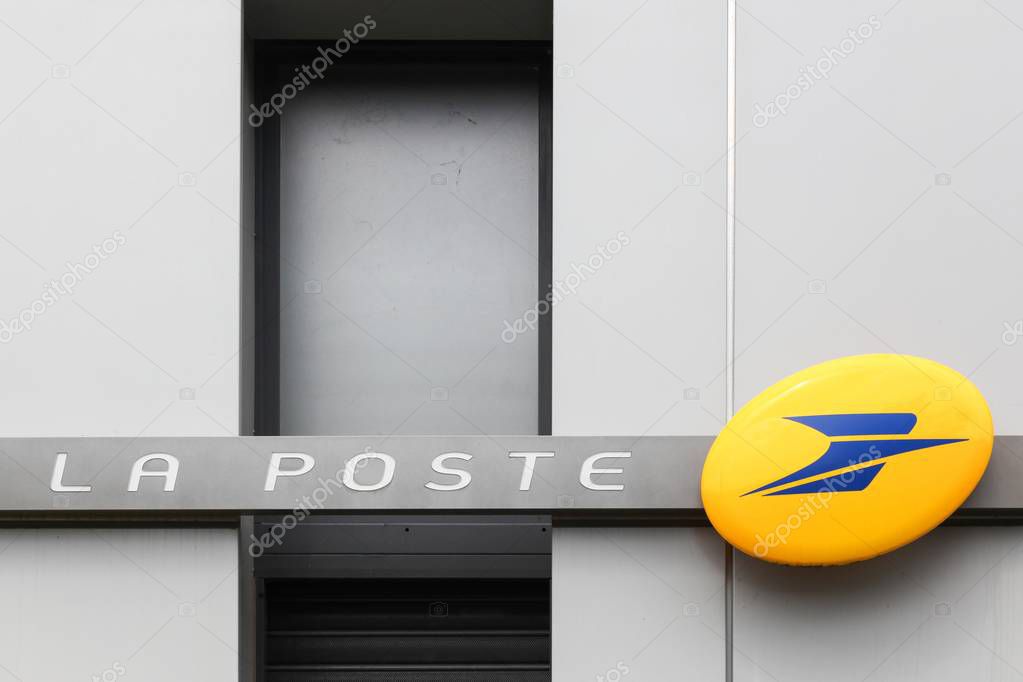 Lyon, France - May 26, 2018: Facade of La Poste in France. La Poste is a postal service company in France, operating in metropolitan France as well as in the five French overseas departments