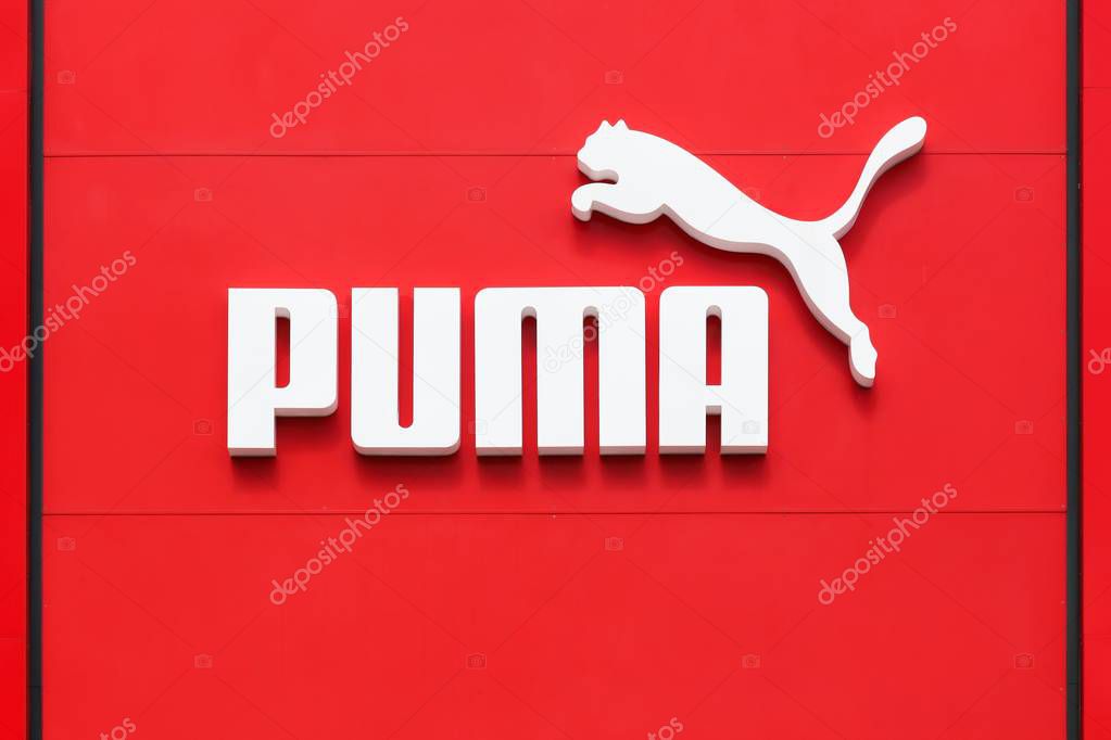 Bremen, Germany - July 2, 2017: Puma logo on a wall. Puma is a major german multinational company that produces athletic, casual footwear, sportswear, headquartered in Germany
