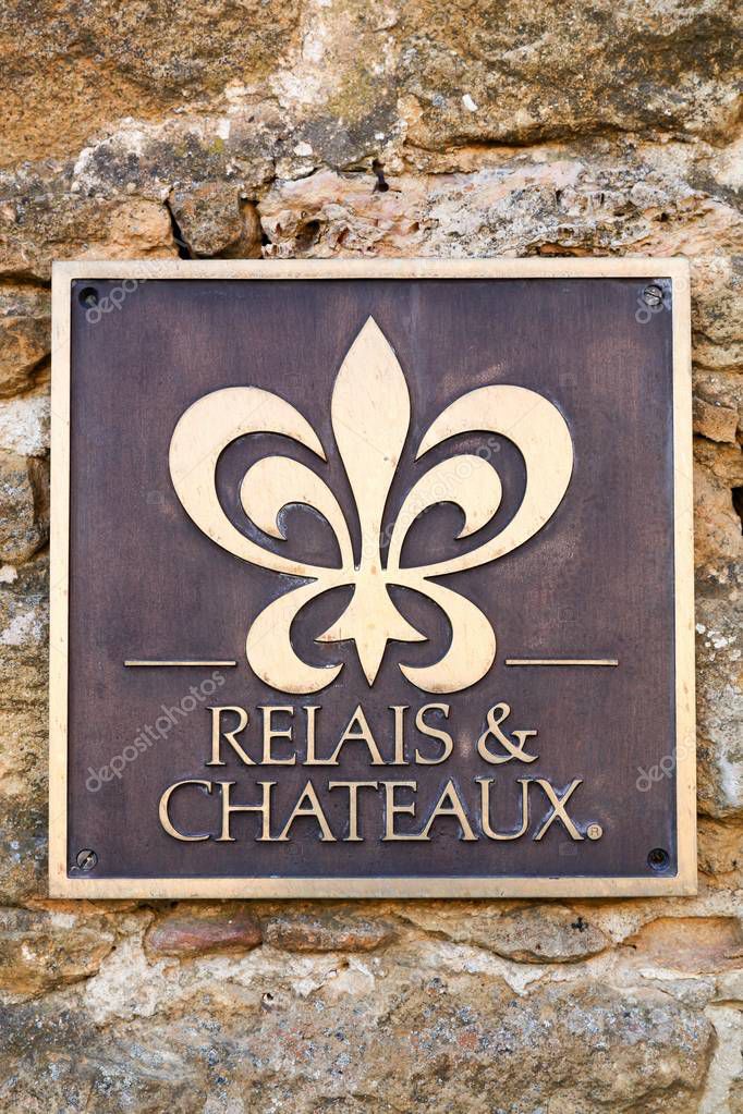 Bagnols, France - February 25, 2017: Relais and Chateaux symbol on a wall. Relais and Chateaux is a global fellowship of individually owned and operated luxury hotels and restaurants