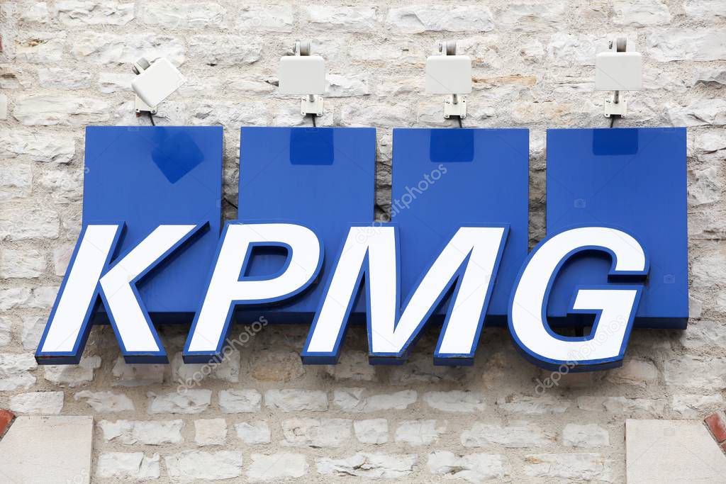 Chalon sur Saone, France- June 22, 2019: KPMG logo on a wall. KPMG is one of the largest professional services companies in the world and one of the big four auditors
