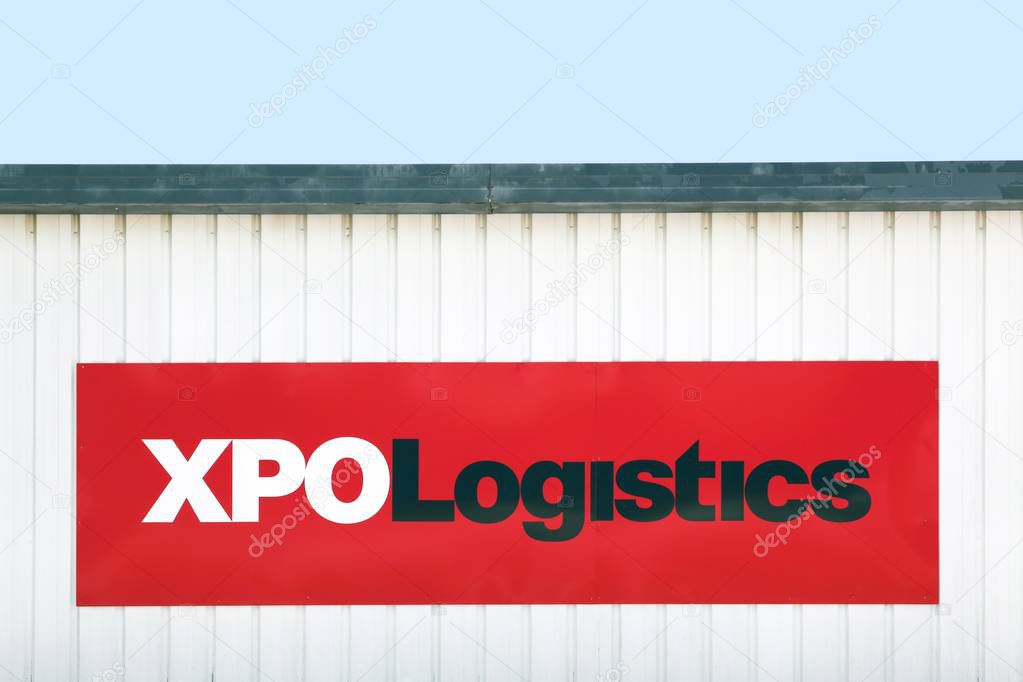 Fontanil, France - June 16, 2019: XPO logistics warehouse. XPO logistics is one of the 10 largest providers of transportation and logistics services in the world and It operates in 32 countries