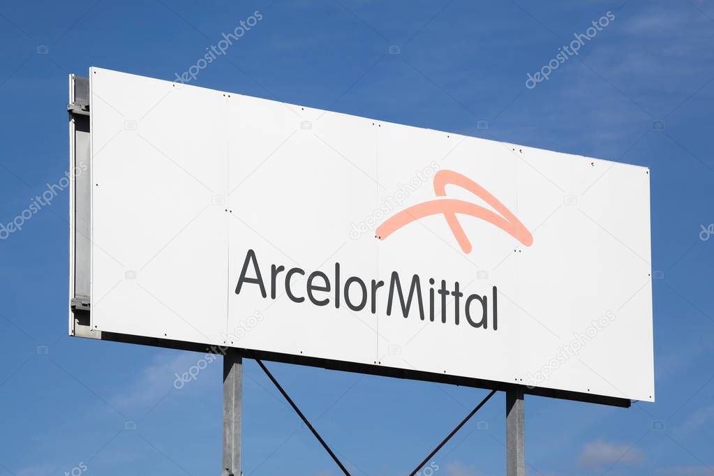 Bourg-en-Bresse, France - August 10, 2019: ArcelorMittal logo on a panel. ArcelorMittal is a multinational steel manufacturing corporation and it is the world's largest steel producer
