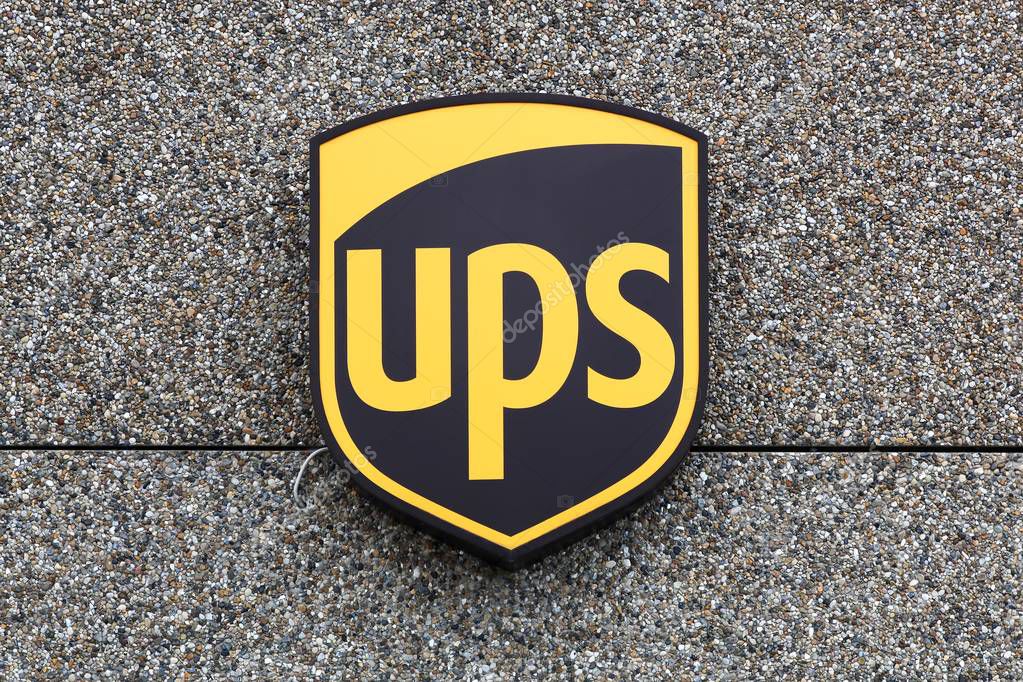 Holme, Denmark - June 5, 2019: UPS logo on a facade. United Parcel Service is the worlds largest package delivery company and a provider of supply chain management solutions