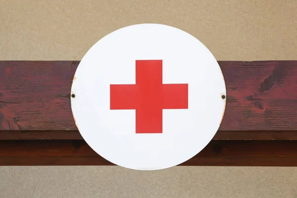 First aid sign on a wall