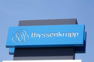 Saint-Genis-Laval, France - May 21, 2020: Thyssenkrupp logo on a signboard. Thyssenkrupp is a German multinational conglomerate, based in Duisburg and Essen and divided into 670 subsidiaries worldwide clipart