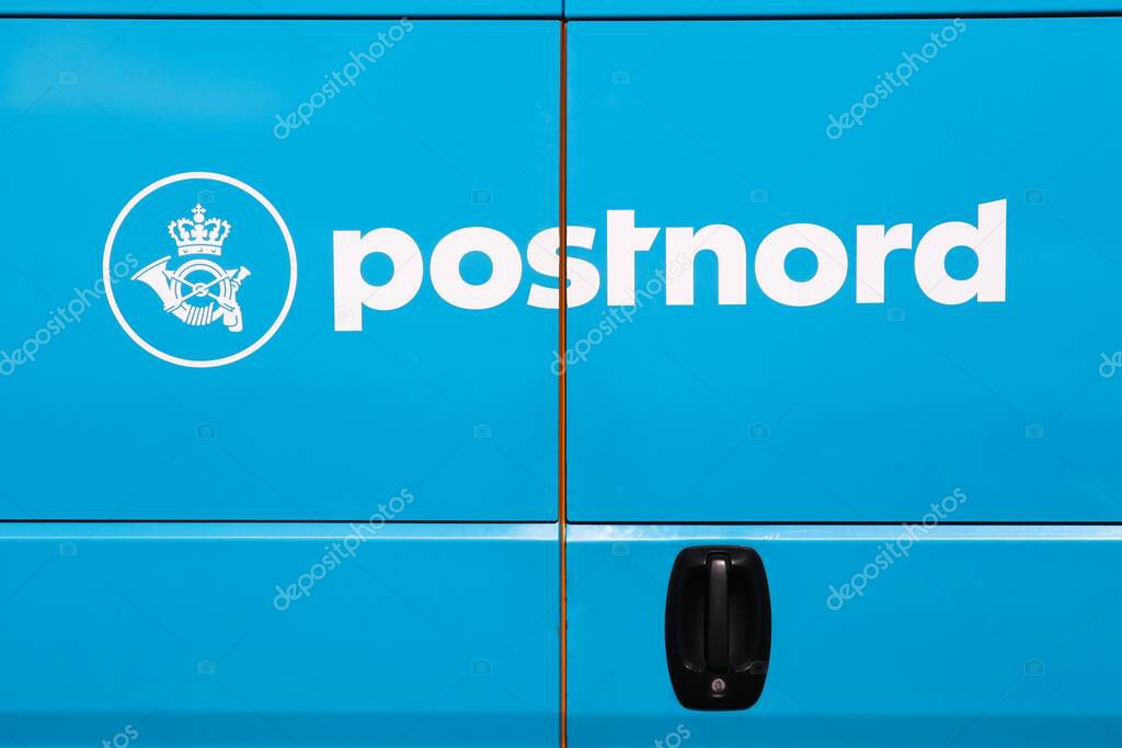 Risskov, Denmark - May 11, 2019: Postnord logo on a vehicle Postnord is the name of the holding company of the two merged postal companies Posten AB and Post Danmark