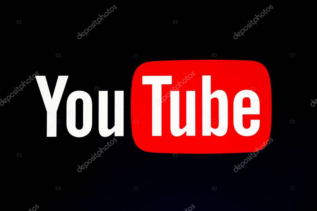 Roanne, France - May 31, 2020: YouTube logo on a wall. YouTube is an American online video-sharing platform headquartered in San Bruno, California