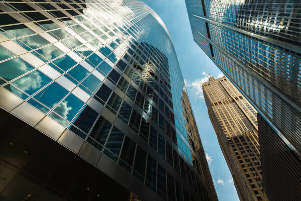 Upward view of modern skyscrapers in downtown Chicago.